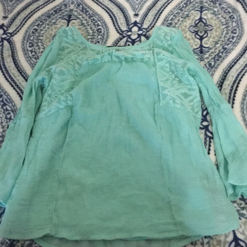 A teal shirt